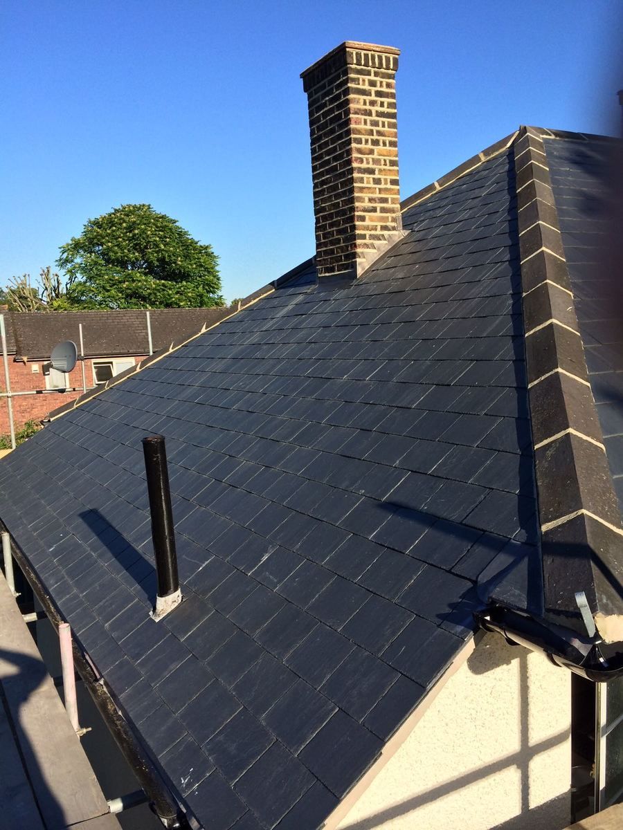 Professional roofing team at work - quality roof installation and repair services